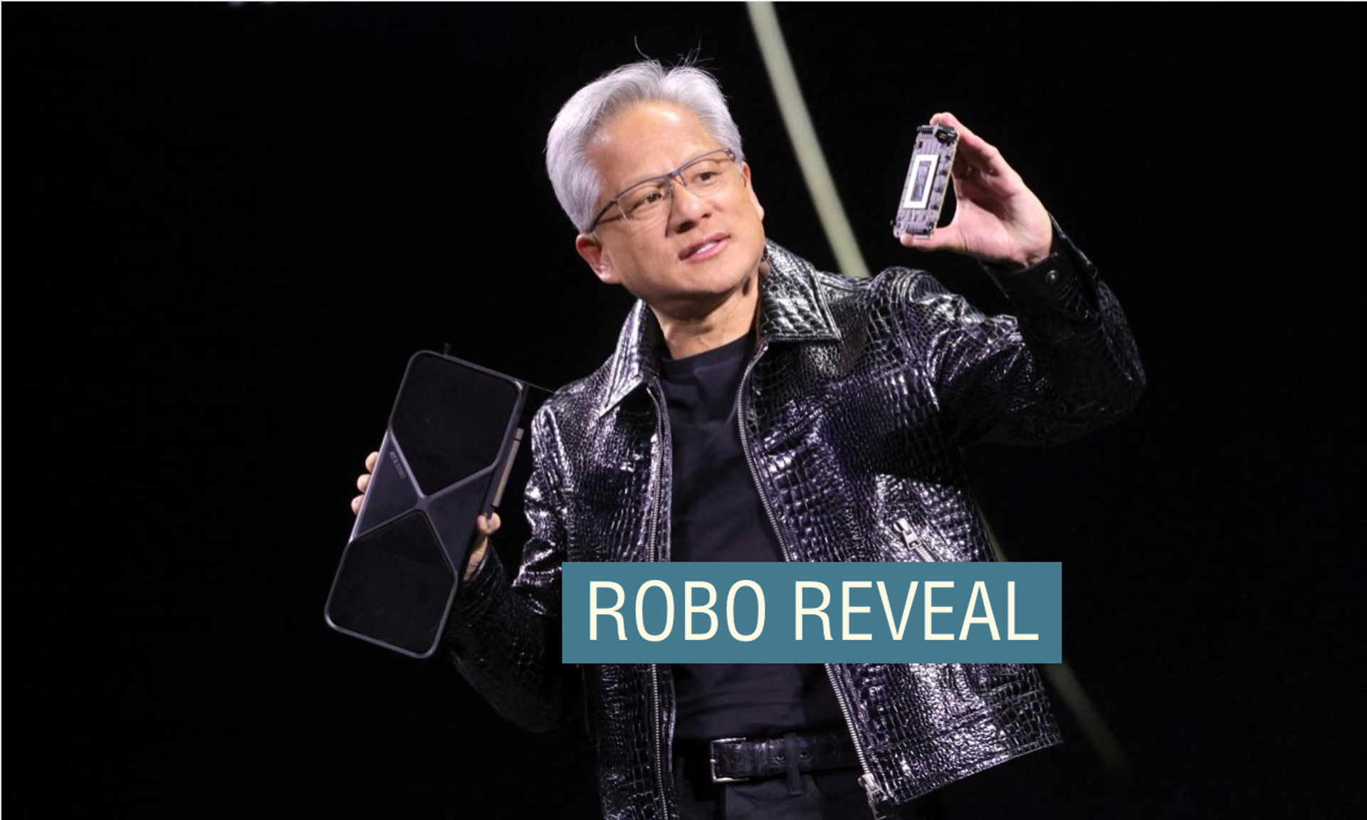 Nvidia CEO Jensen Huang holds a new Nvidia GeForce RTX 5090 graphics card as he gives a keynote address at CES 2025, an annual consumer electronics trade show, in Las Vegas.