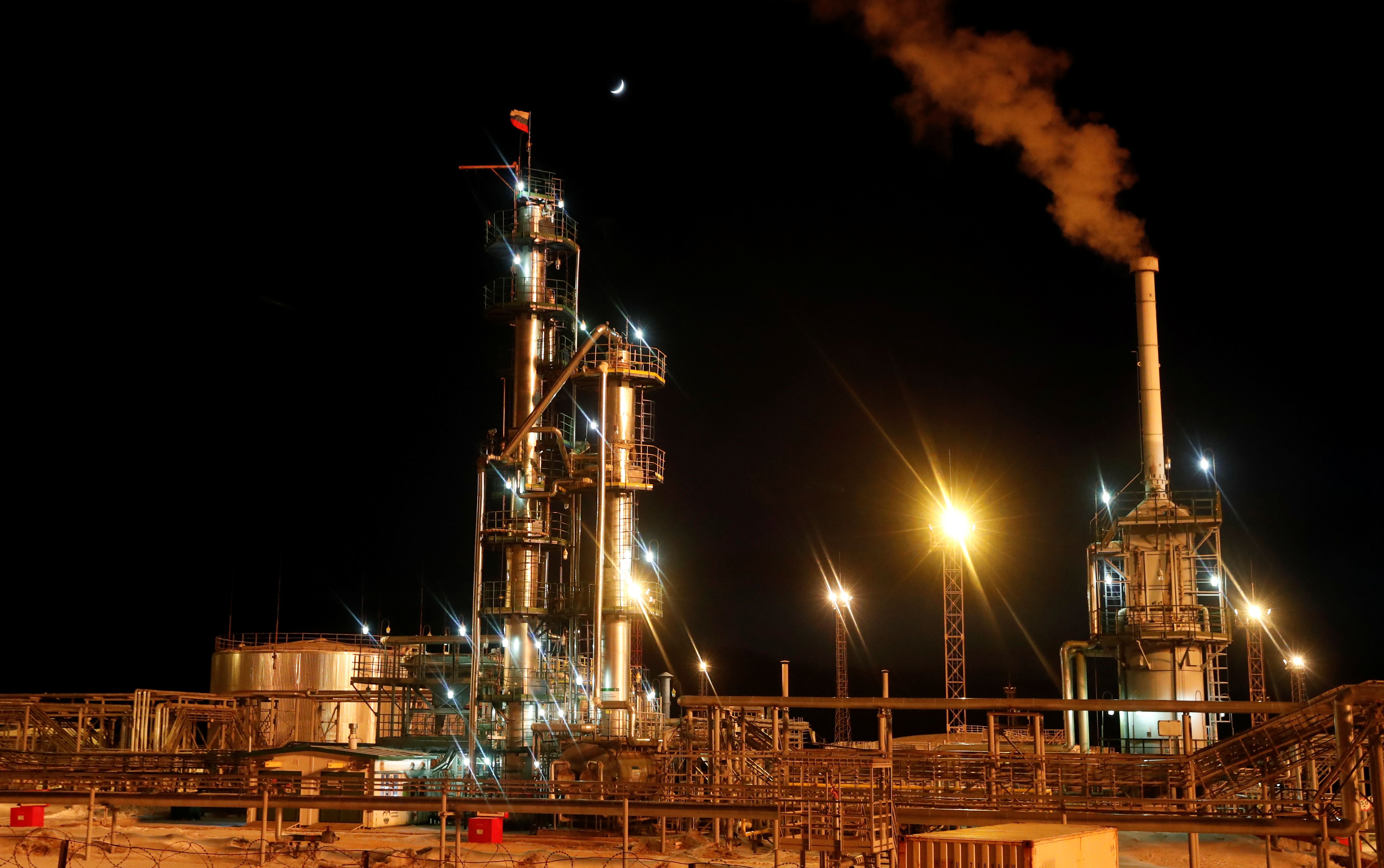A Russian state flag flies on the top of a diesel plant in the Yarakta Oil Field, owned by Irkutsk Oil Company (INK), in Irkutsk Region, Russia.