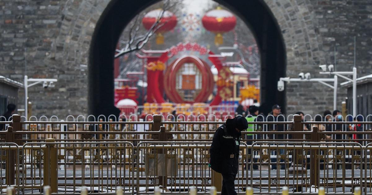 China cuts growth target to lowest ever