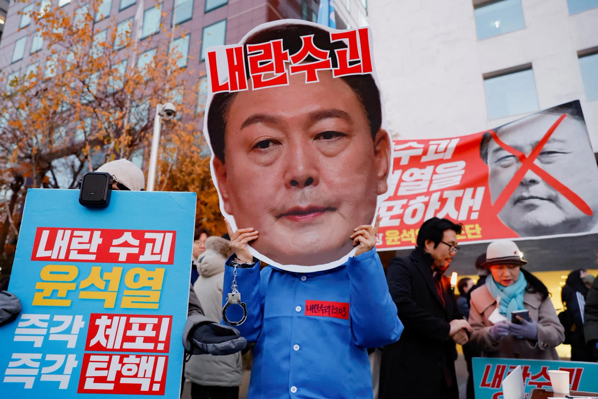 Protesters take part in a rally calling for the impeachment of South Korean President Yoon Suk Yeol, in Seoul.