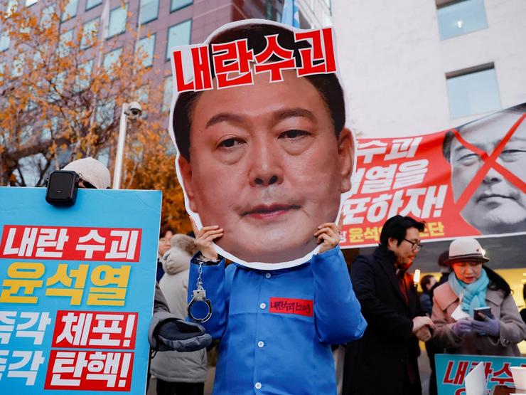 Protesters take part in a rally calling for the impeachment of South Korean President Yoon Suk Yeol, in Seoul.