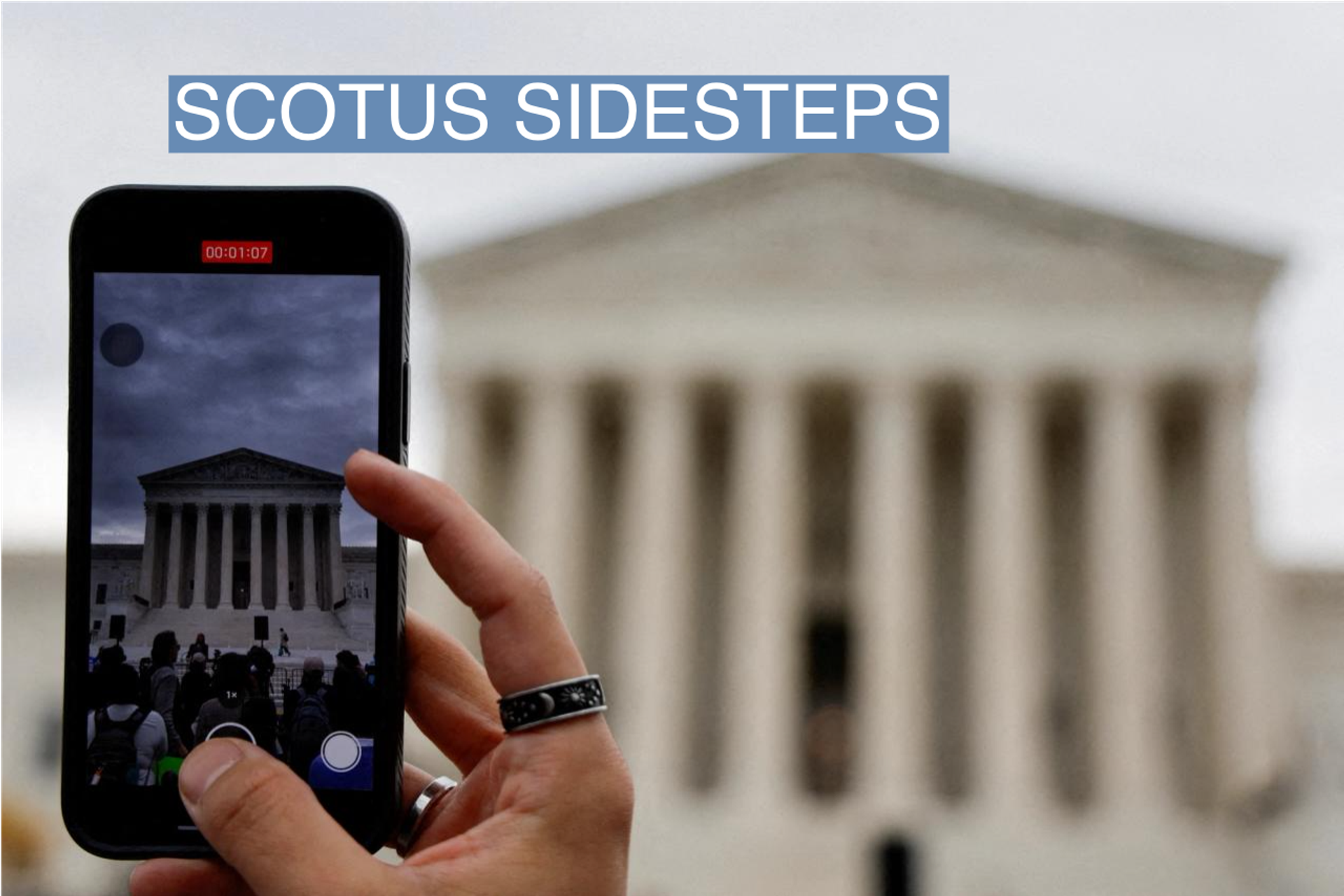 A person shoots with a mobile at the U.S. Supreme Court building in Washington, U.S. October 31, 2022.