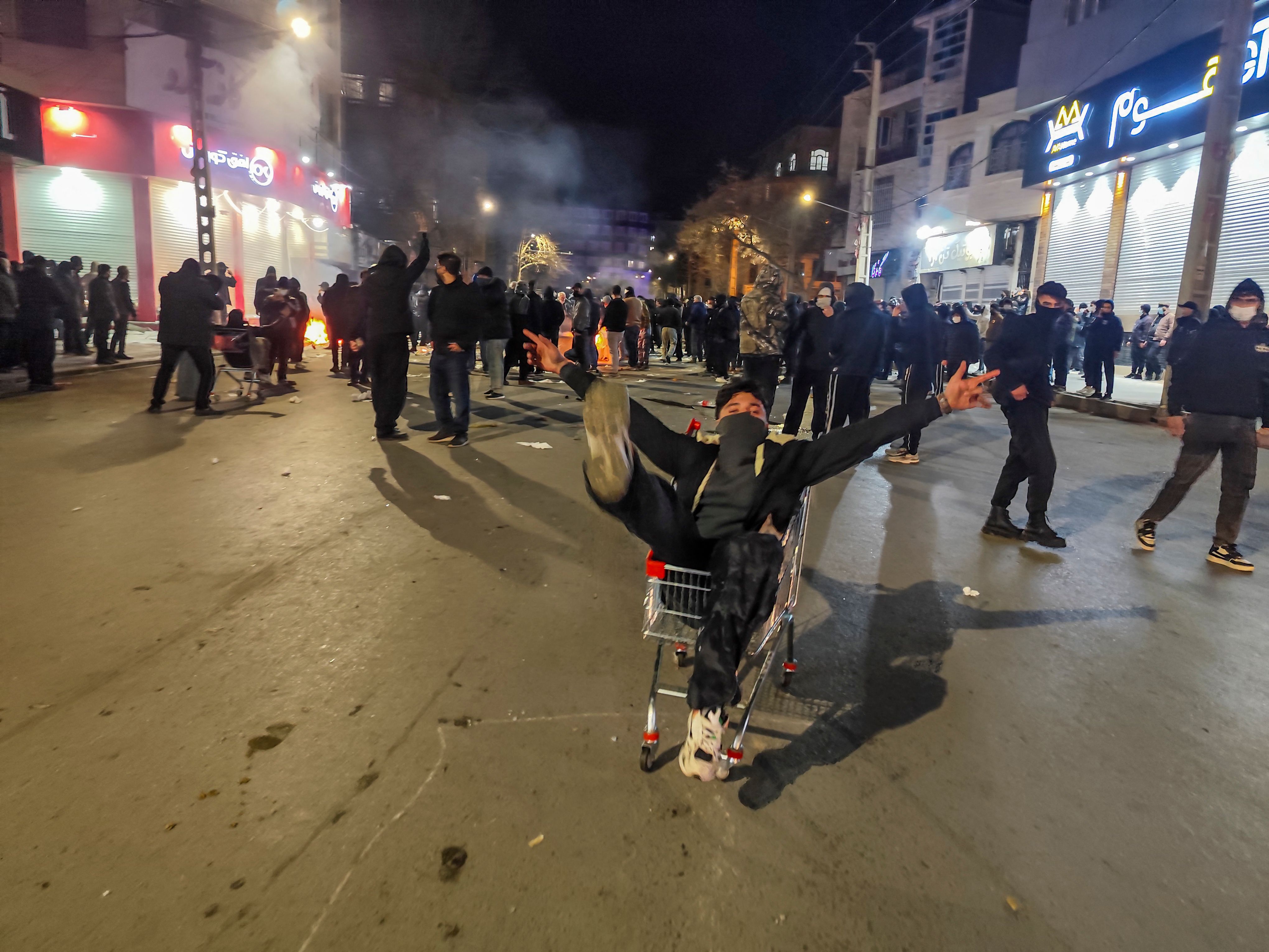 Iranians gather while blocking a street during a protest in Kermanshah, Iran on January 8, 2026. 