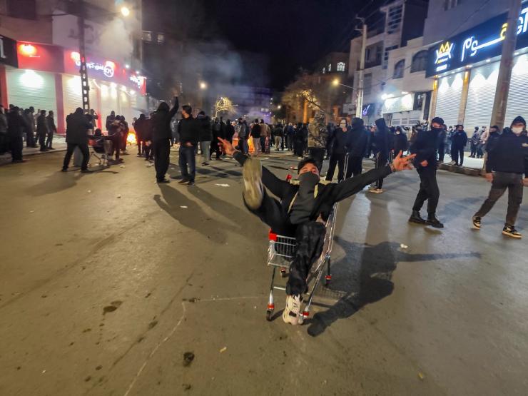 Iranians gather while blocking a street during a protest in Kermanshah, Iran on January 8, 2026.