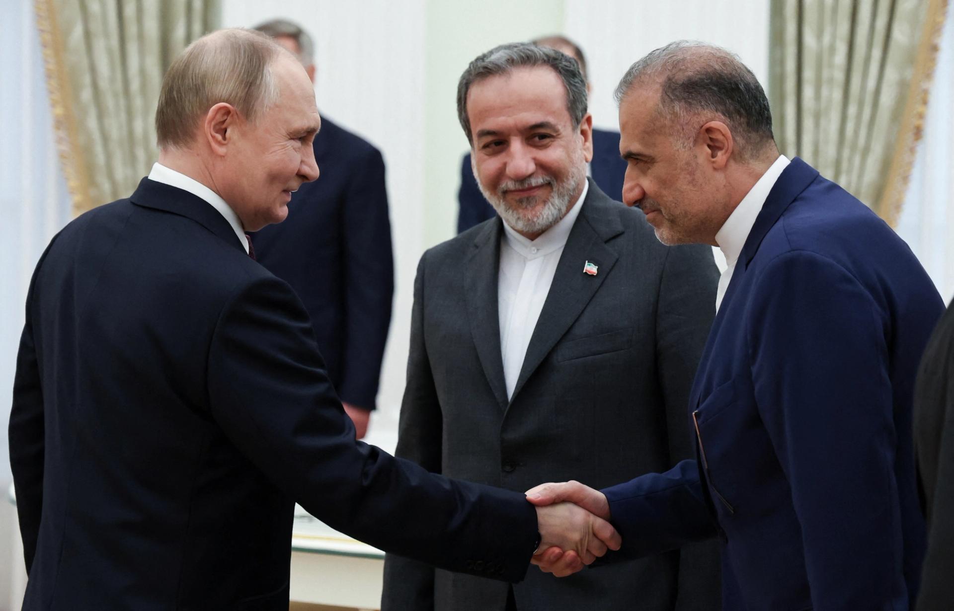 Russian President Vladimir Putin welcomes Iranian Ambassador to Russia Kazem Jalali and Iranian Foreign Minister Abbas Araqchi during a meeting at the Kremlin in Moscow, Russia June 23, 2025. 