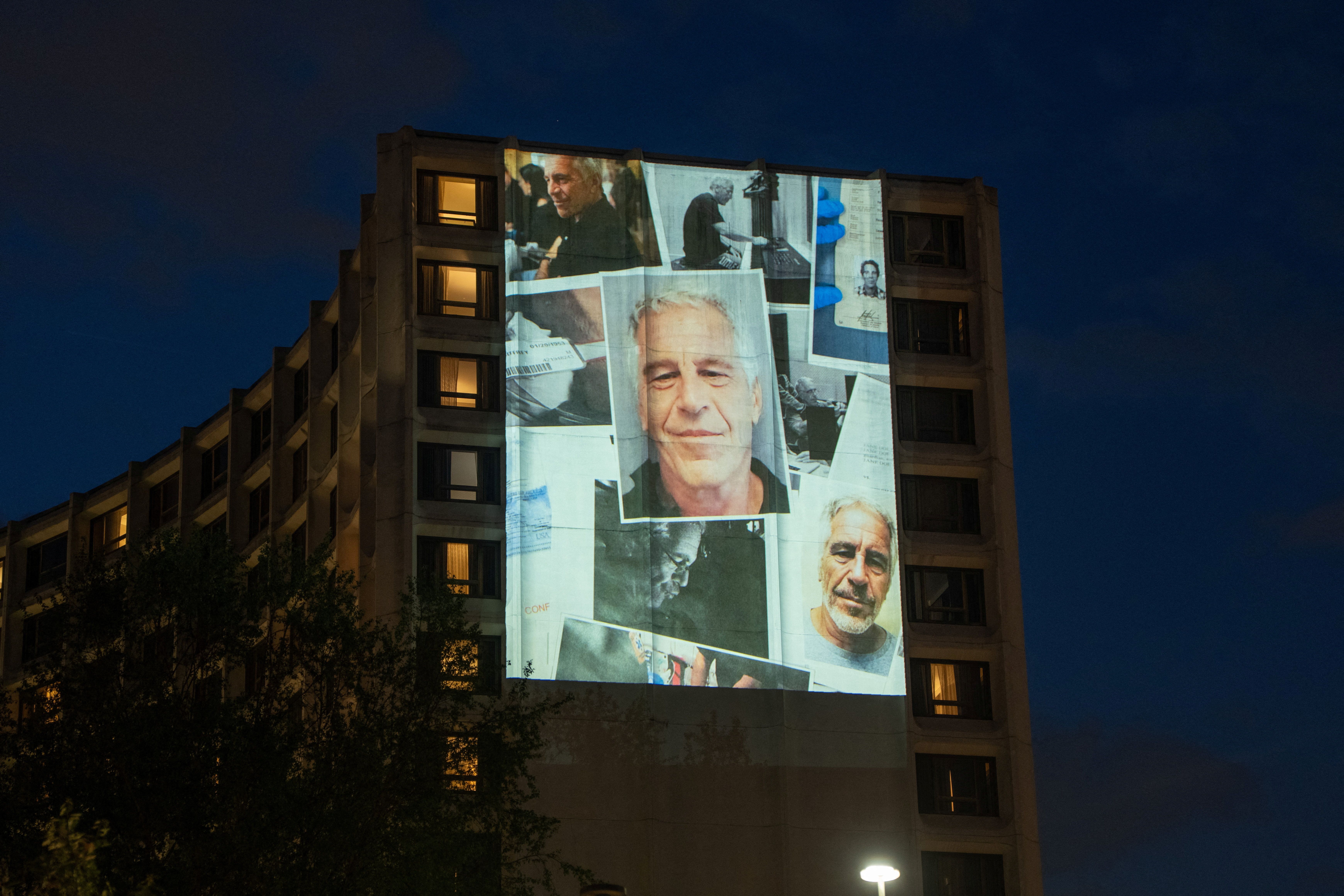 Photos of late financier and convicted sex offender Jeffrey Epstein are projected onto the Washington Hilton in Washington, D.C., U.S., April 24, 2026. 
