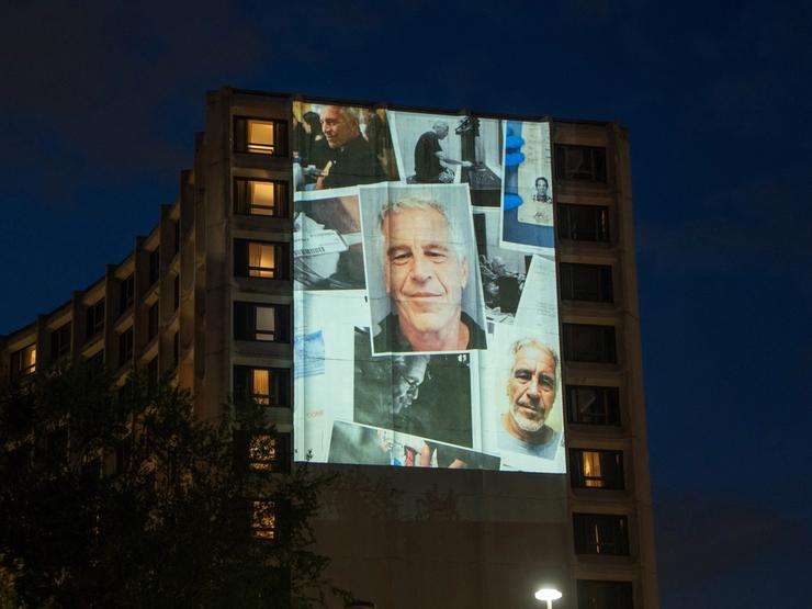 Photos of late financier and convicted sex offender Jeffrey Epstein are projected onto the Washington Hilton in Washington, D.C., U.S., April 24, 2026.
