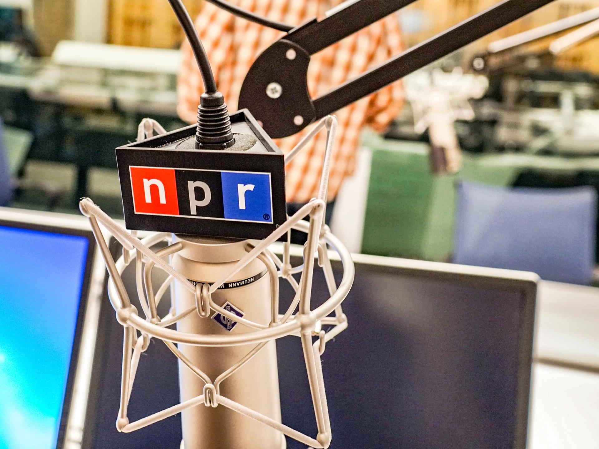 A microphone with the NPR logo