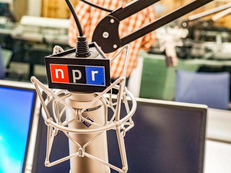 A microphone with the NPR logo