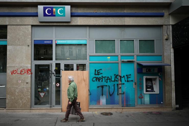 Graffiti outside of a bank in Paris, France