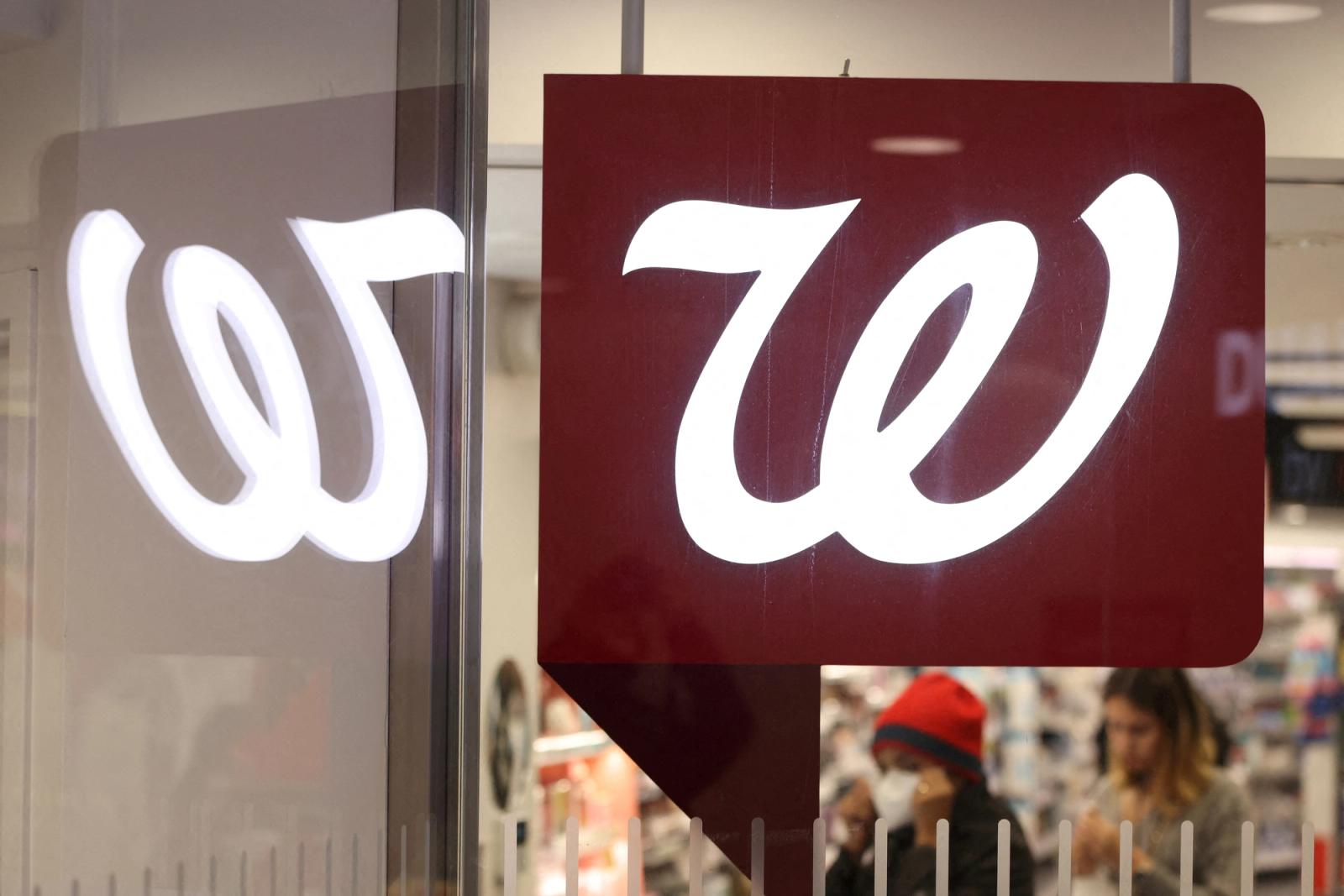 People are seen shopping in a Walgreens, owned by the Walgreens Boots Alliance, Inc., in Manhattan, New York City, U.S.