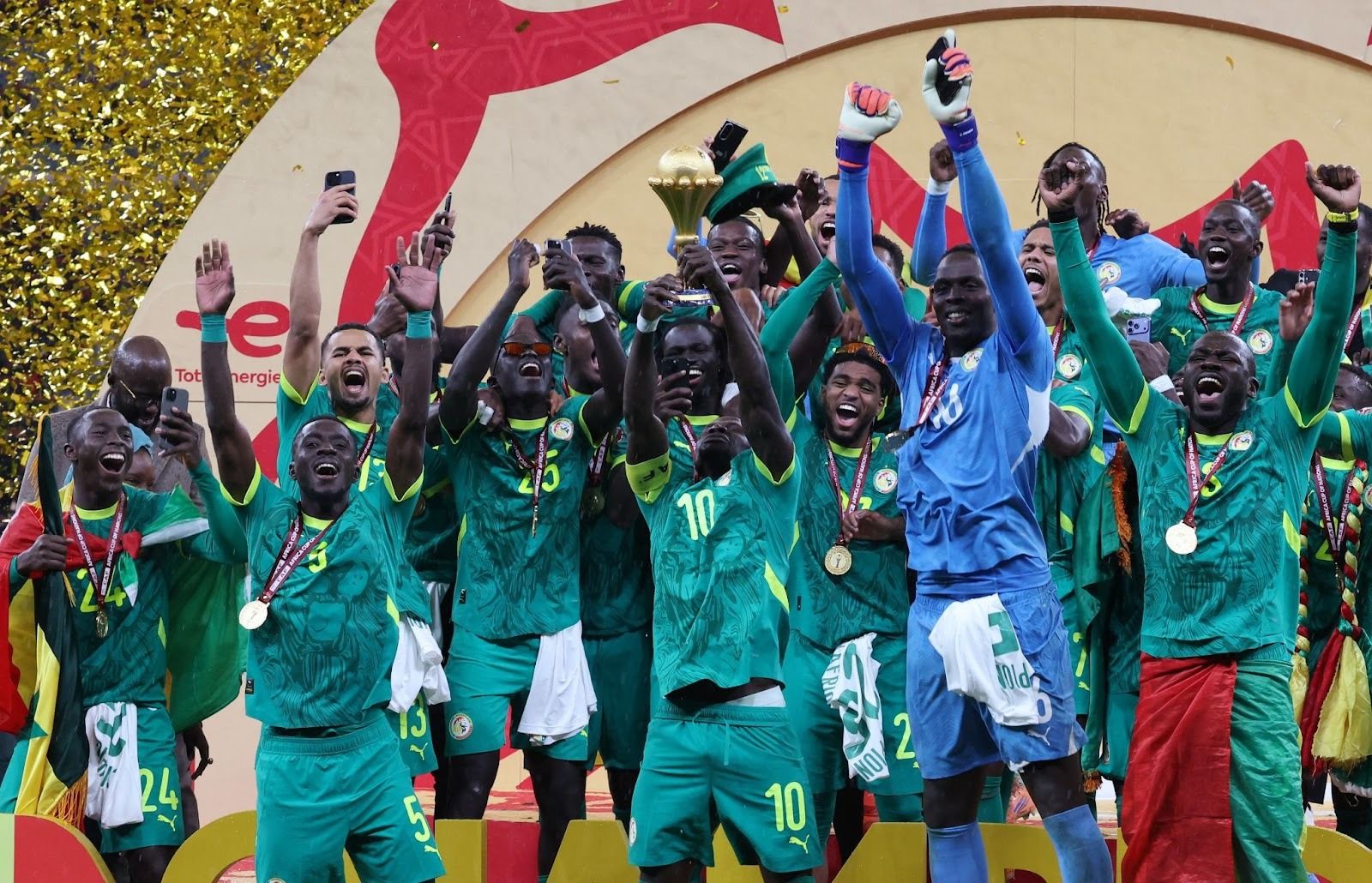 Senegal lifting the trophy. 