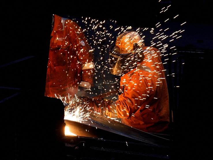 Workers work at the British Steel site in Scunthorpe, Lincolnshire, Britain