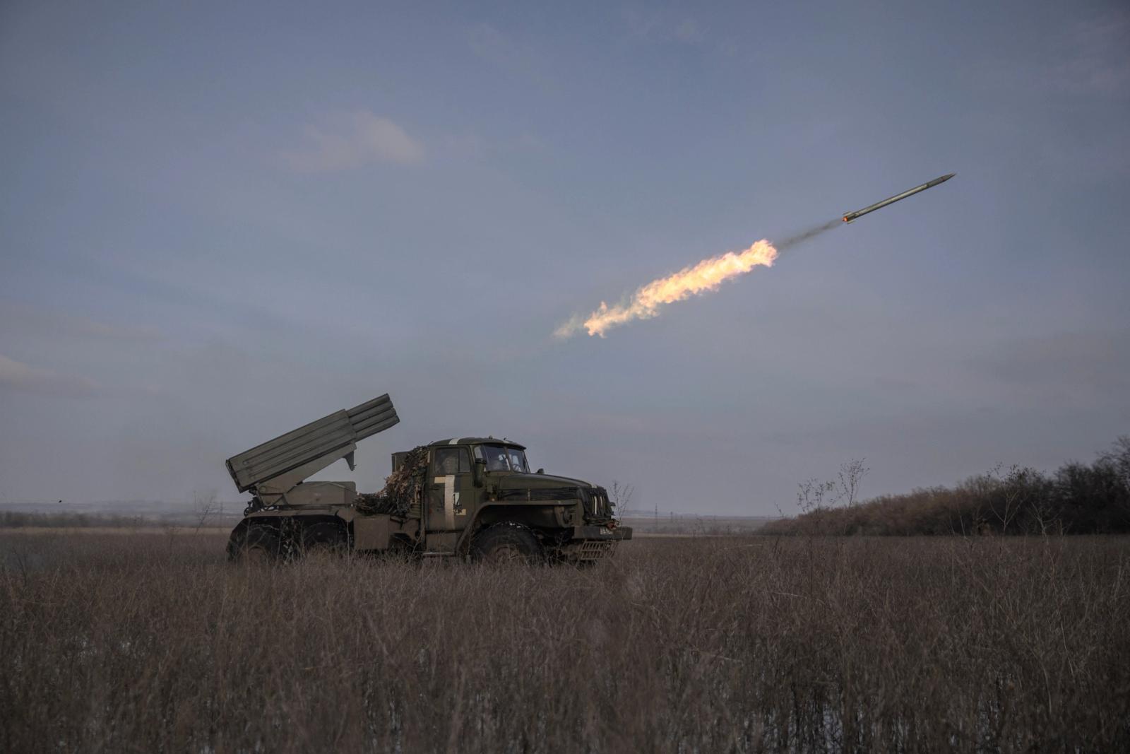 Ukrainian servicemen fire a BM-21 Grad multiple launch rocket system towards Russian positions on a frontline near the town of Marinka, amid Russia's attack on Ukraine, in Donetsk region, Ukraine, February 7, 2023.