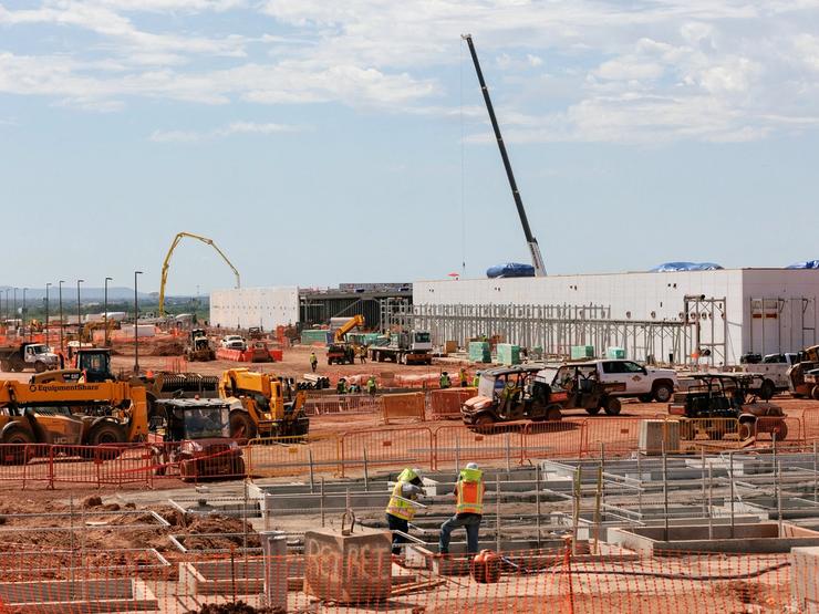 Data center buildings are under construction during a tour of the OpenAI data center in Abilene, Texas