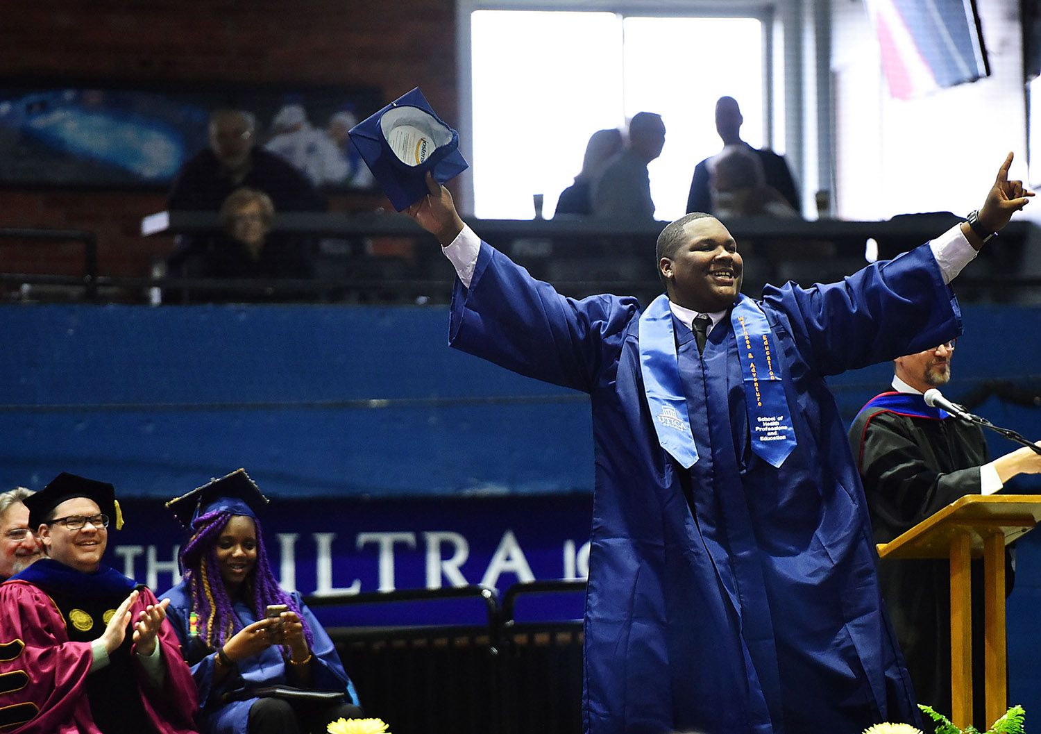 A student at a commencement ceremony.