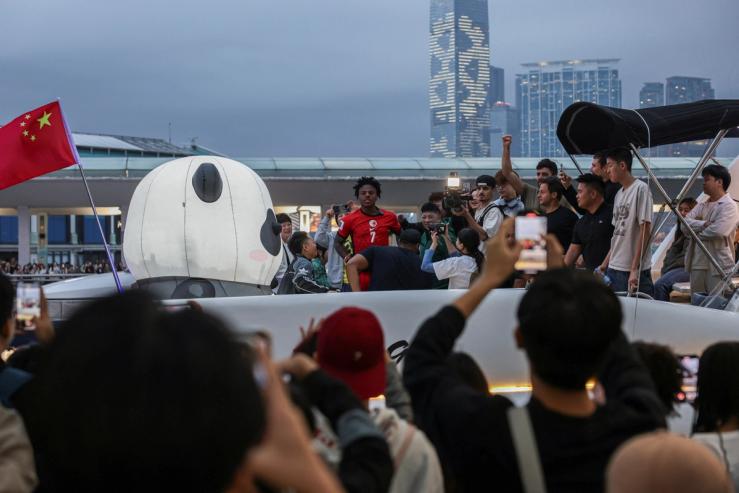 U.S. YouTuber Darren Watkins Jr., better known as “IShowSpeed”, is seen during a boat trip in Hong Kong, China