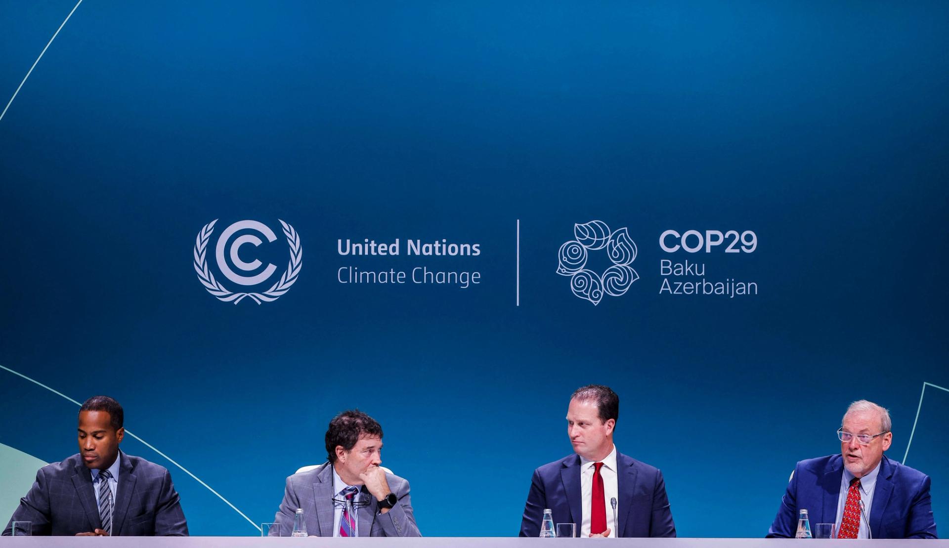 Republican congressmen John James, Troy Balderson, August Pfluger, and Morgan Griffith attend a press conference at COP29 