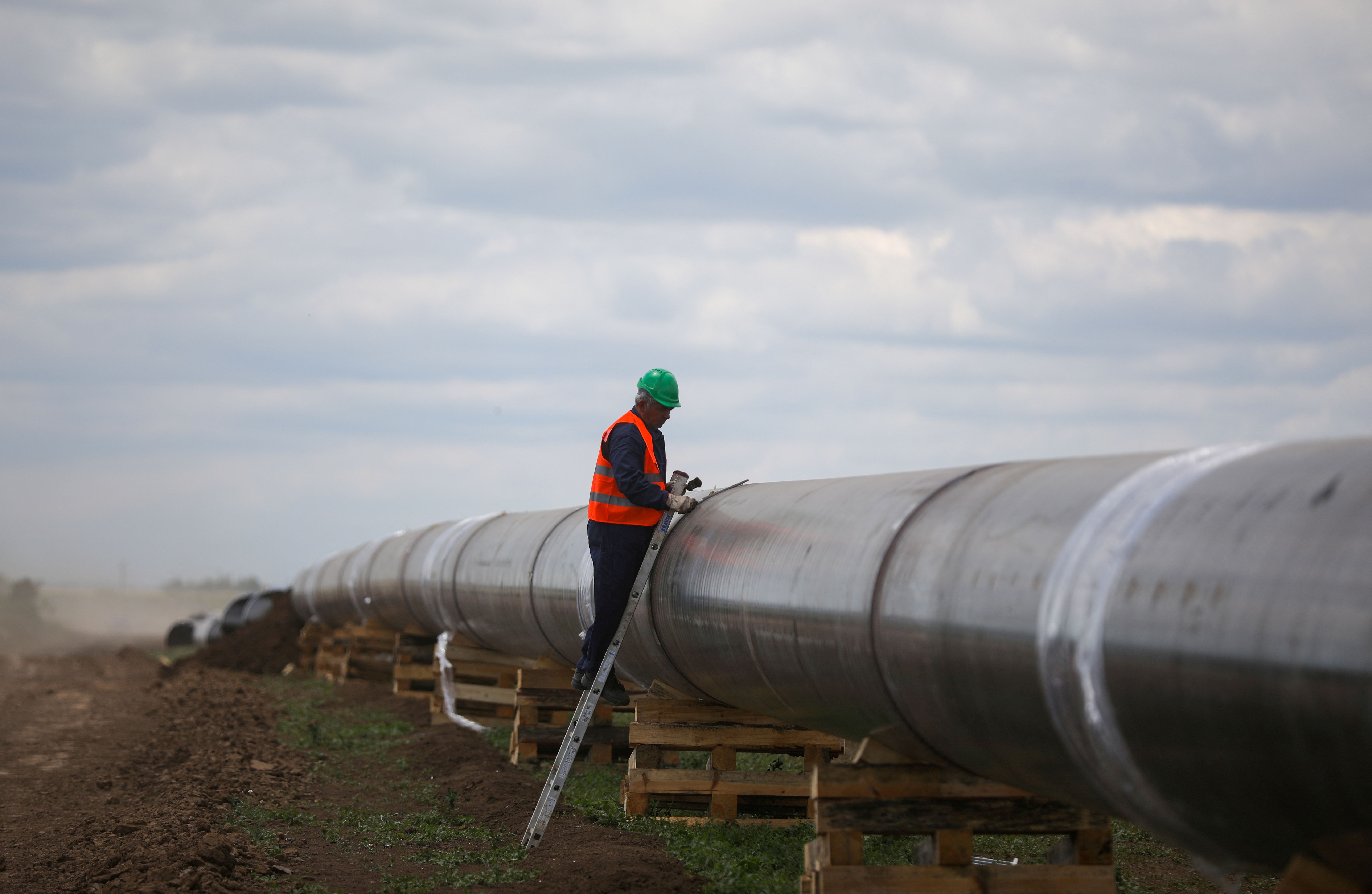 A worker on a Russian gas pipeline.