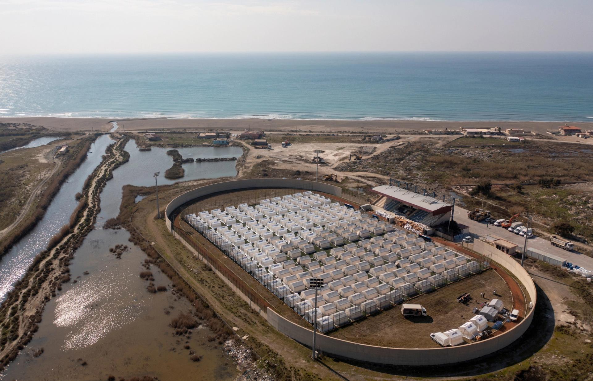 A general view of a tent camp established in a soccer stadium for earthquake survivors in Samandag town of the Hatay province, Turkey February 13, 2023