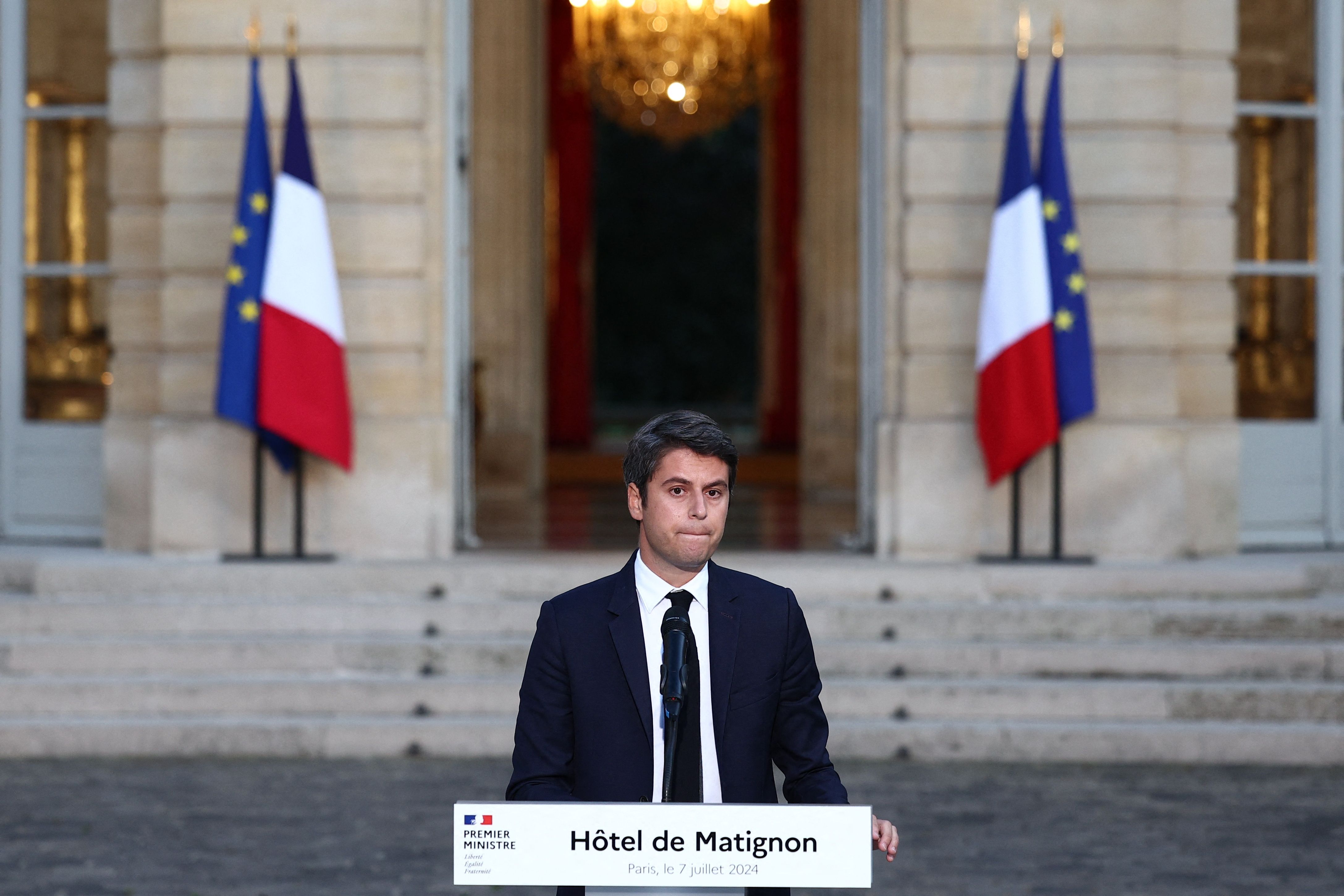 Gabriel Attal, French Prime Minister and French presidential majority group “Ensemble pour la Republique” candidate, delivers a speech after partial results in the second round of the early French parliamentary elections, at Hotel Matignon in Paris in Paris, France, July 7, 2024. REUTERS/Guglielmo Mangiapane