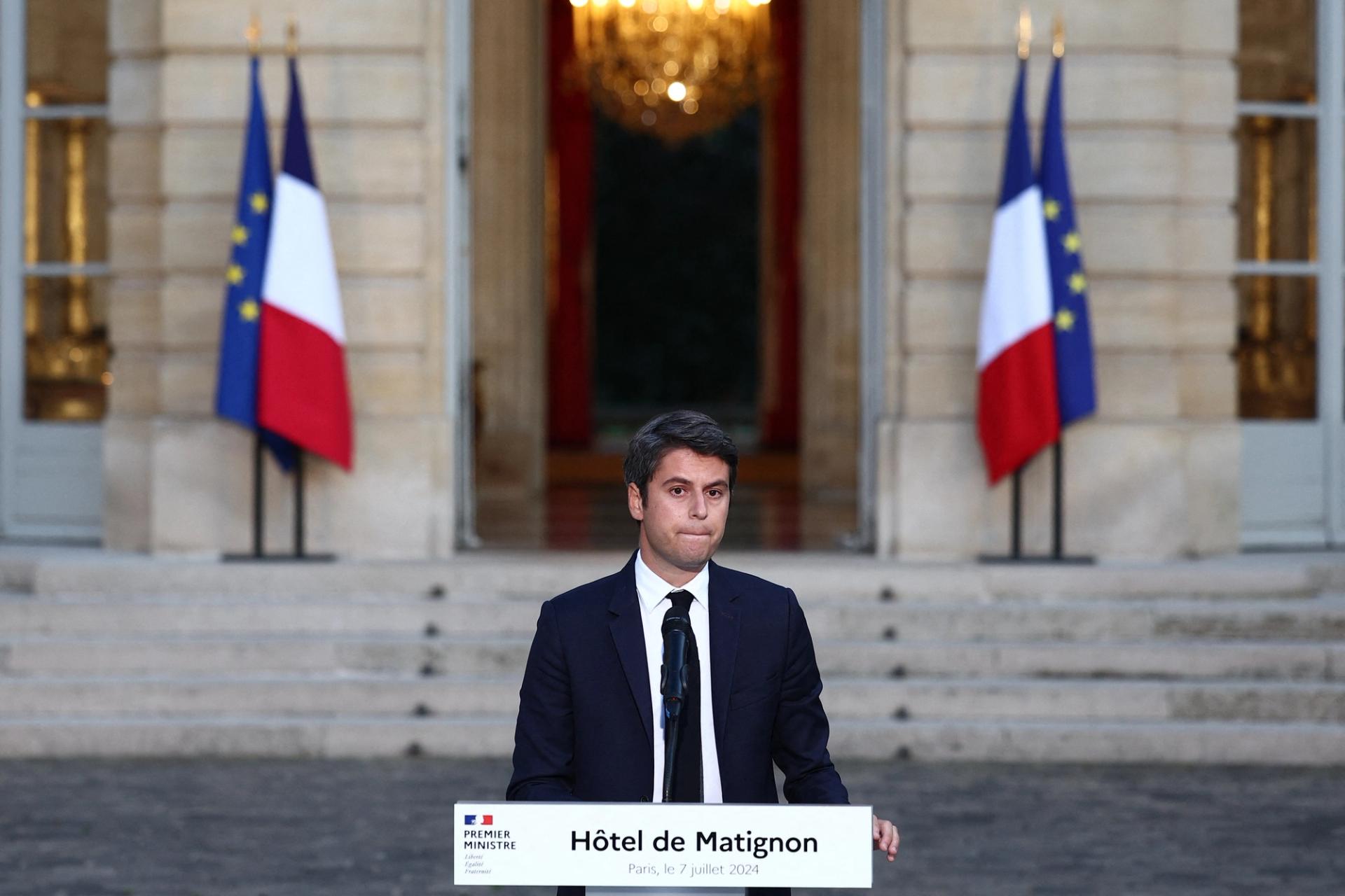 Gabriel Attal, French Prime Minister and French presidential majority group "Ensemble pour la Republique" candidate, delivers a speech after partial results in the second round of the early French parliamentary elections, at Hotel Matignon in Paris in Paris, France, July 7, 2024. REUTERS/Guglielmo Mangiapane