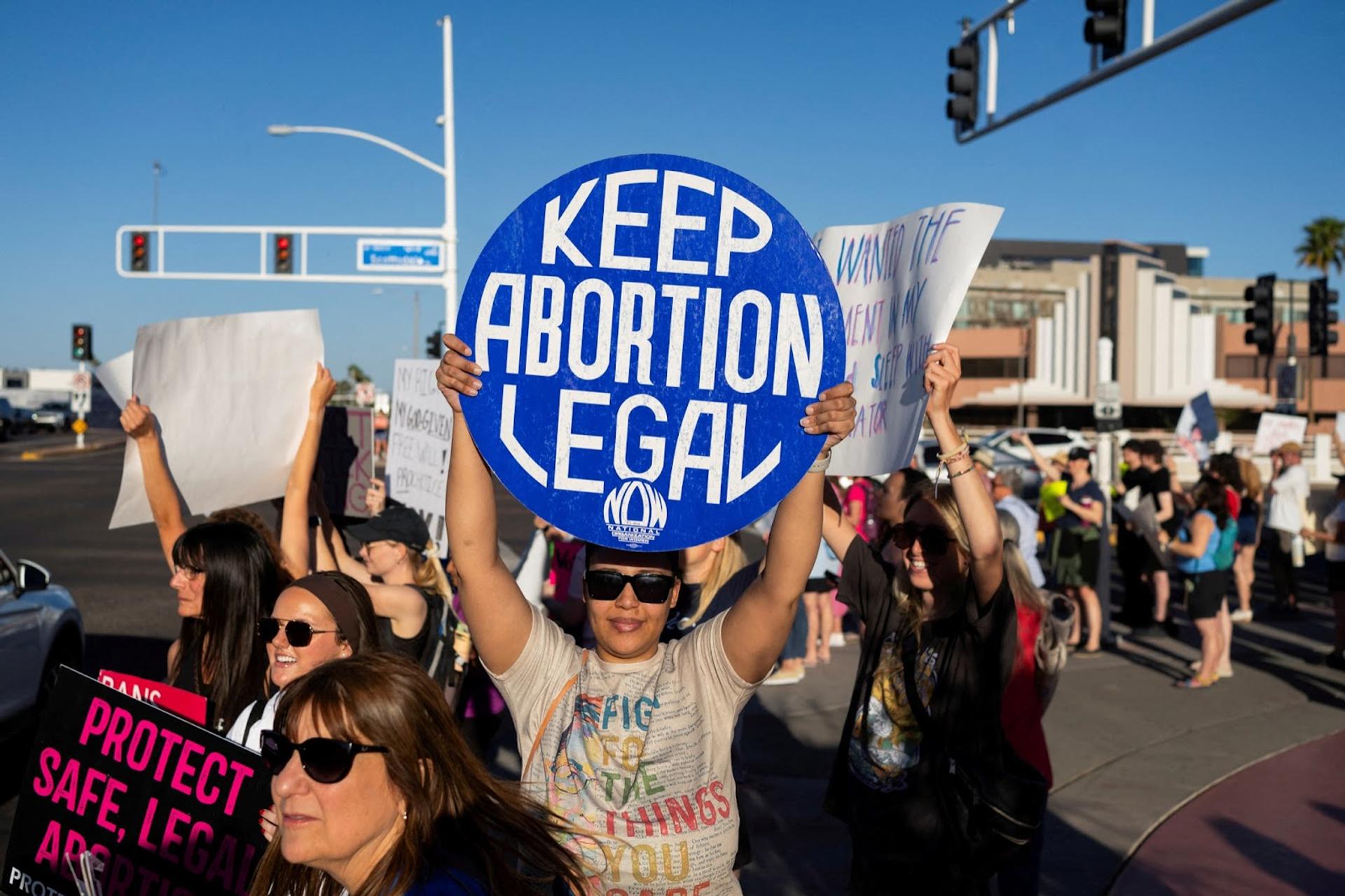 People protest after Arizona’s Supreme Court revived a law dating back to 1864 that bans abortion in virtually all instances, in Scottsdale, Arizona, on April 14, 2024.