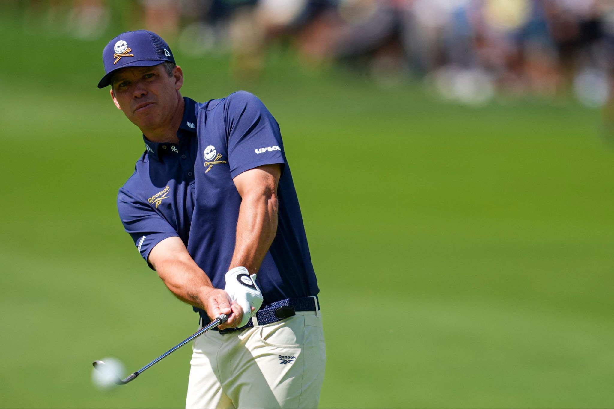 Paul Casey of Crushers GC chips onto the first green during the finals of the LIV Golf Michigan Team Championship