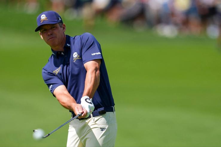 Paul Casey of Crushers GC chips onto the first green during the finals of the LIV Golf Michigan Team Championship