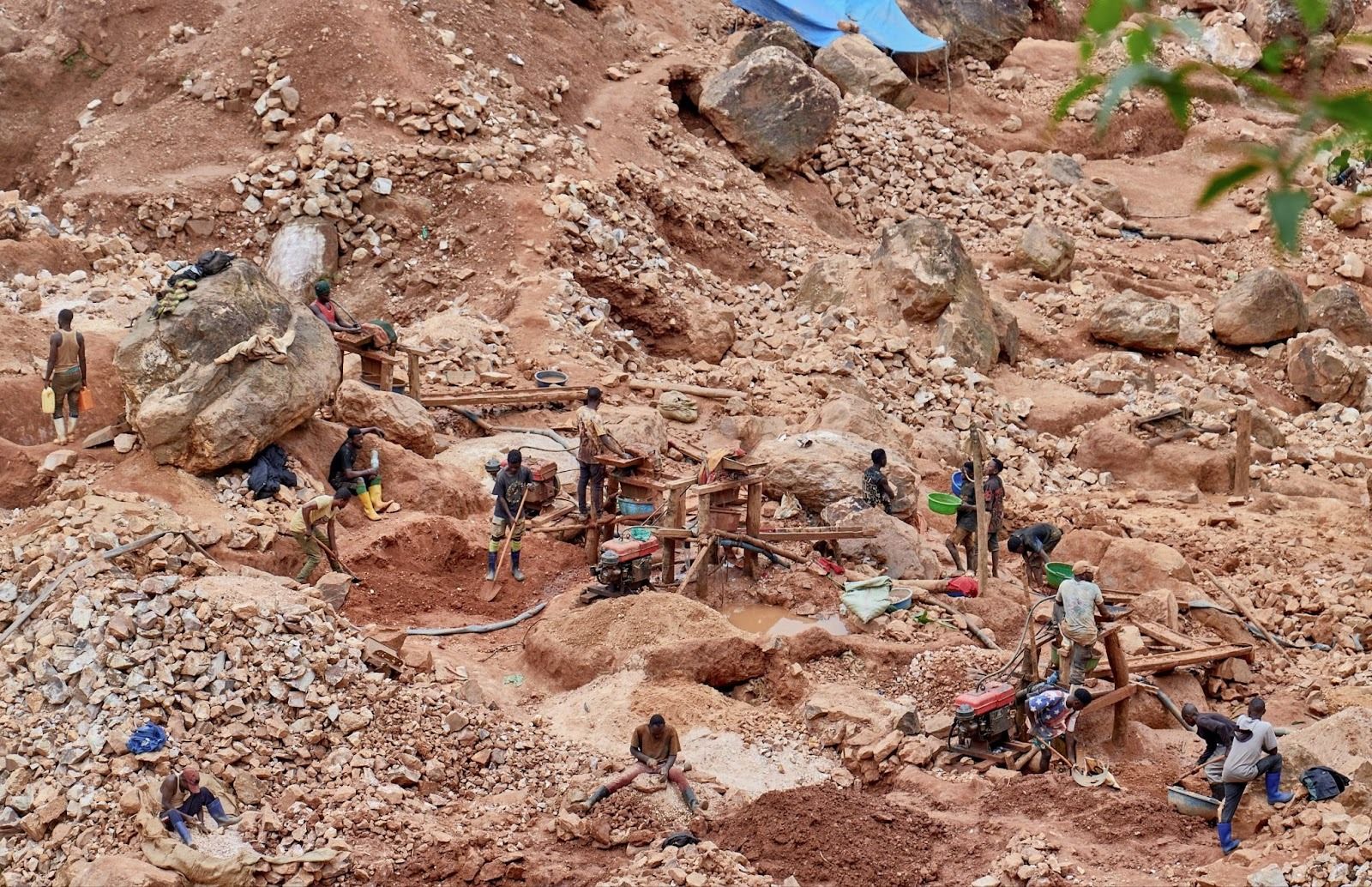Congolese artisanal miners, among them people internally displaced by the Islamic State-affiliated Allied Democratic Forces rebels, dig in an open-pit mine in Mangaredjipa, near Beni, North Kivu Province, DR Congo, on Aug. 31, 2025. 