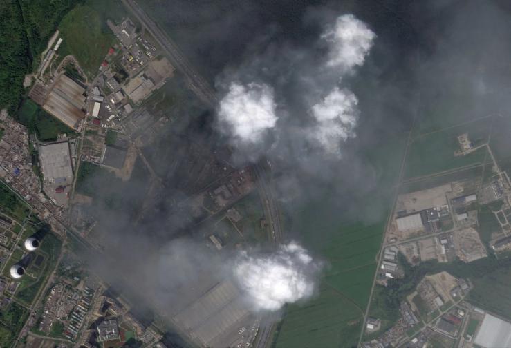 Smoke rising following a drone strike near St Petersburg, Russia.