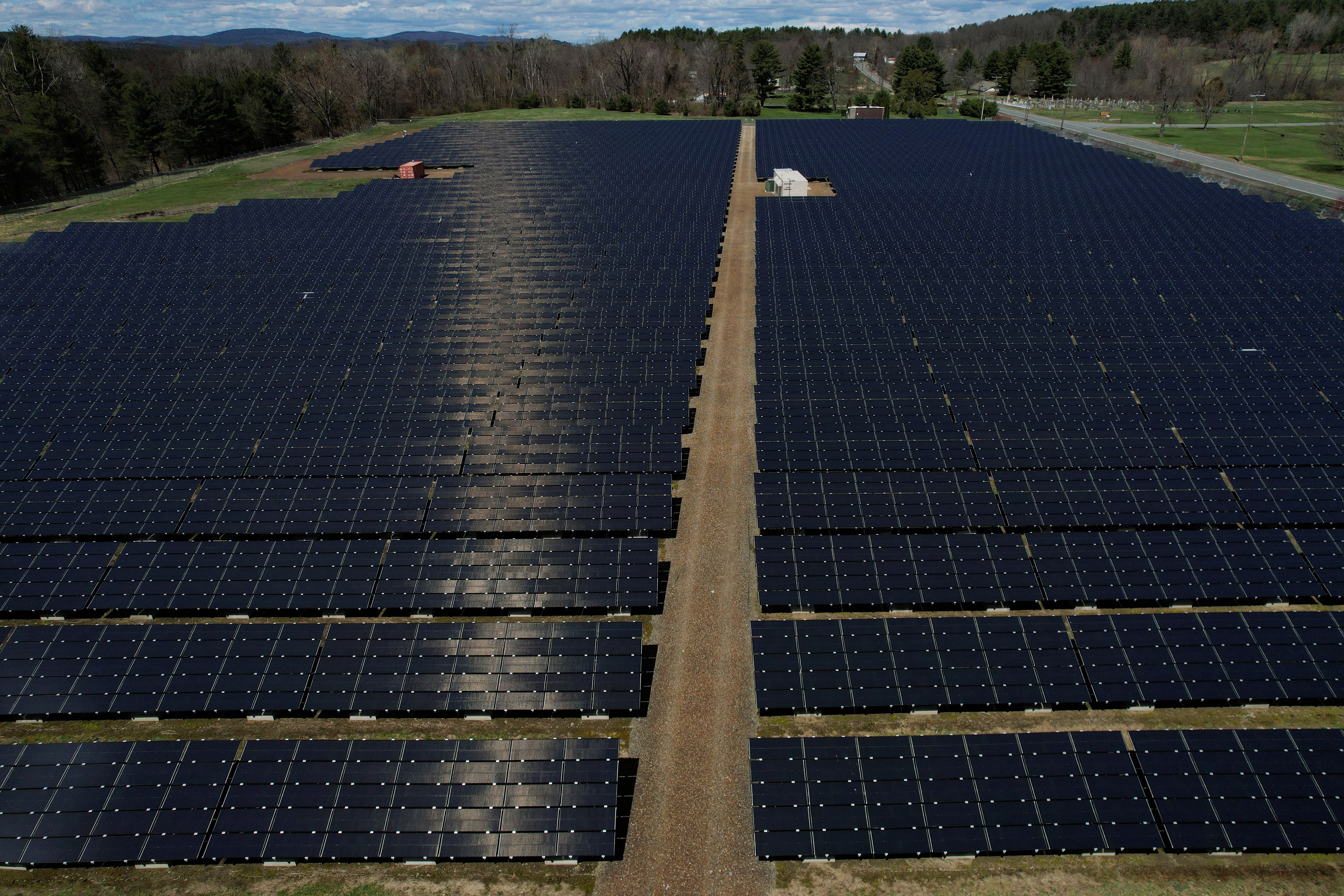 Solar panels are arrayed on Earth Day in Northfield, Massachusetts, U.S., April 22, 2022.