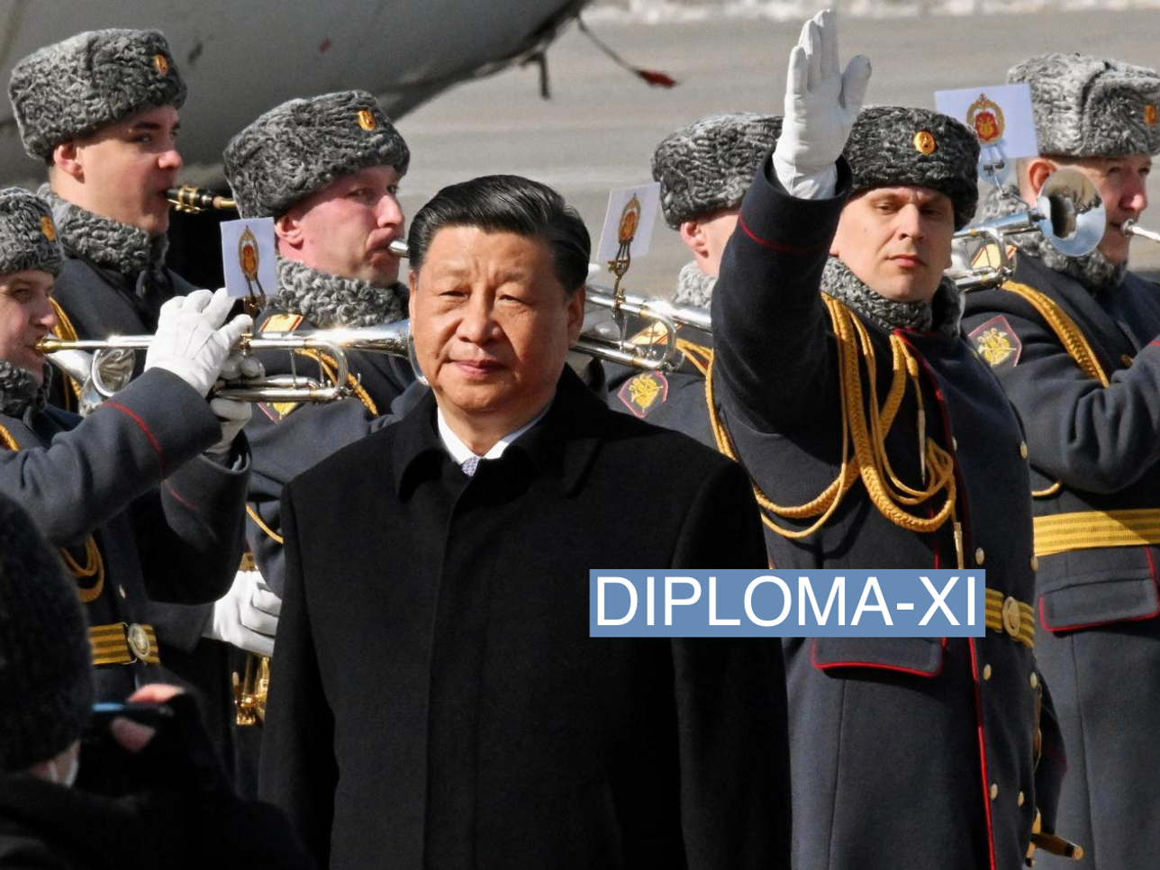 Chinese leader Xi Jinping walks past honour guards and members of a military band during a welcoming ceremony upon his arrival at an airport in Moscow, Russia, March 20, 2023. Kommersant Photo/Anatoliy Zhdanov via REUTERS