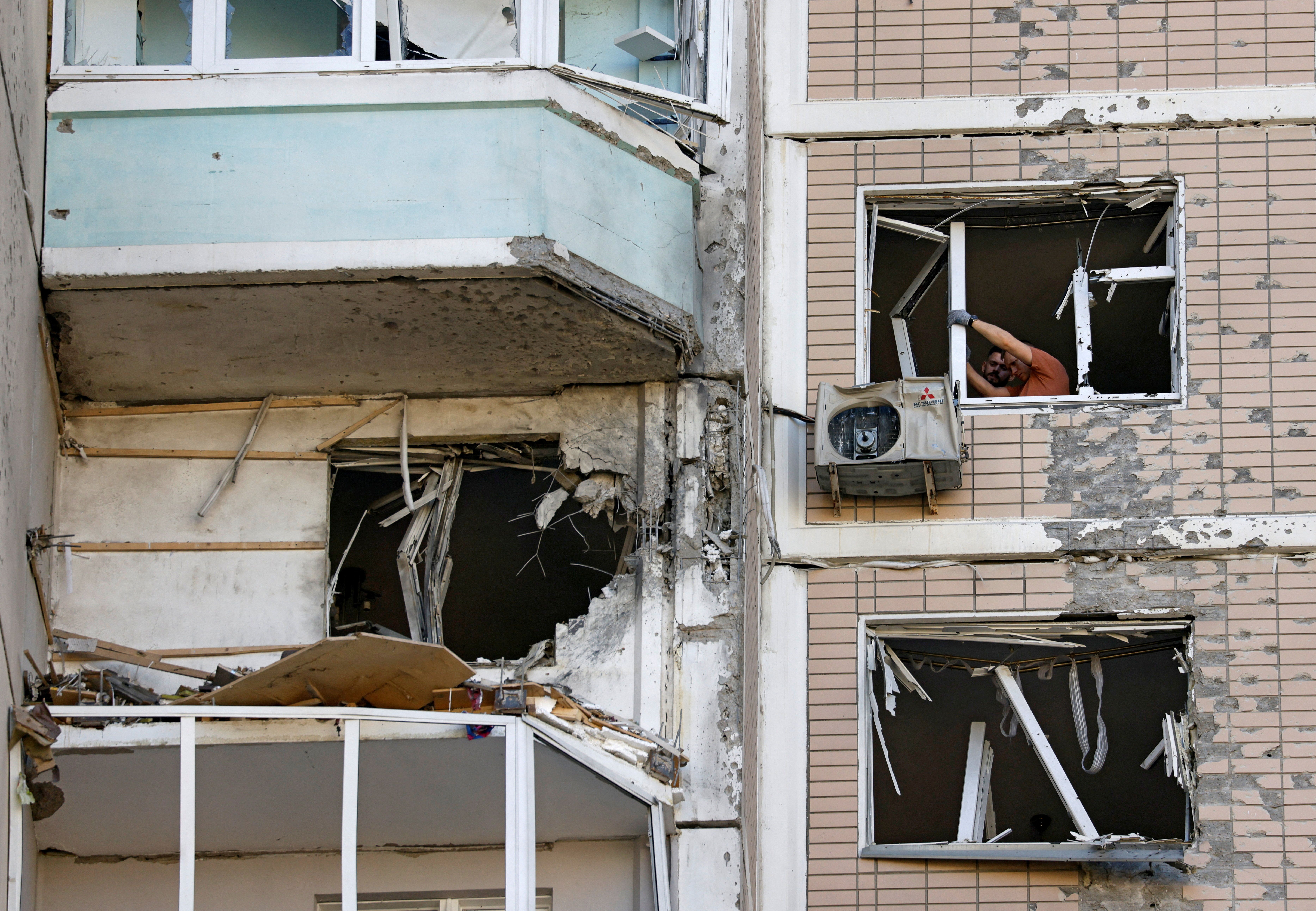 A damaged apartment building following a Ukrainian drone attack near Moscow