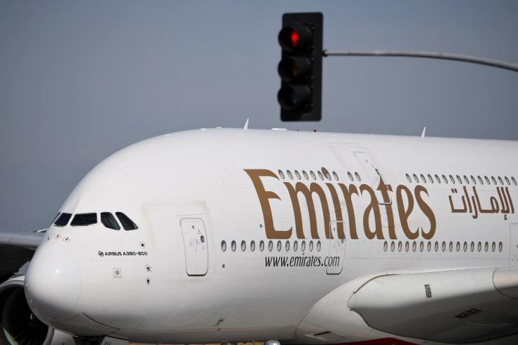 An Emirates plane sits on the tarmac at Los Angeles International Airport.