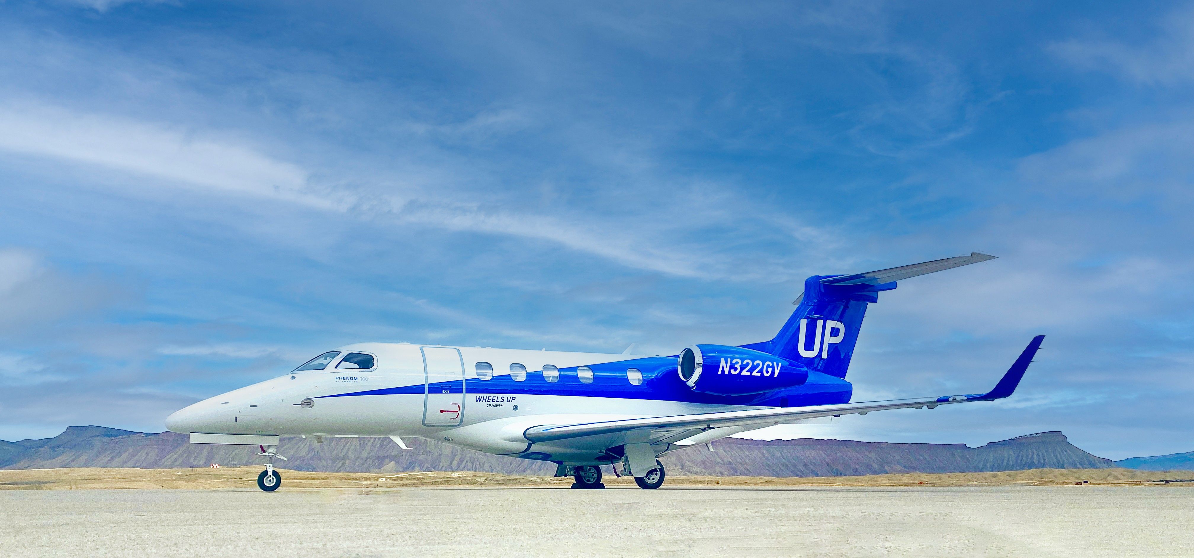 A Wheels Up Phenom 300 jet.