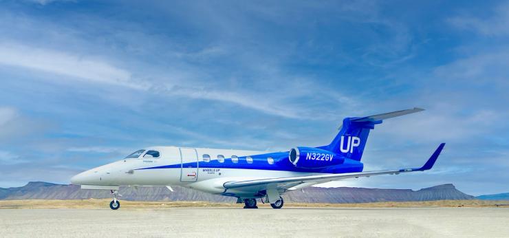 A Wheels Up Phenom 300 jet.