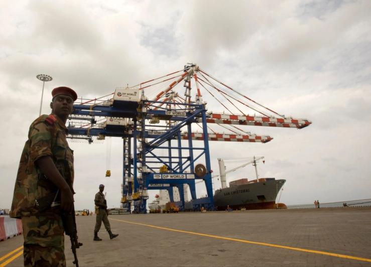 A Djibouti policeman stands guard during the opening ceremony of DP World’s Doraleh container terminal in Djibouti port.