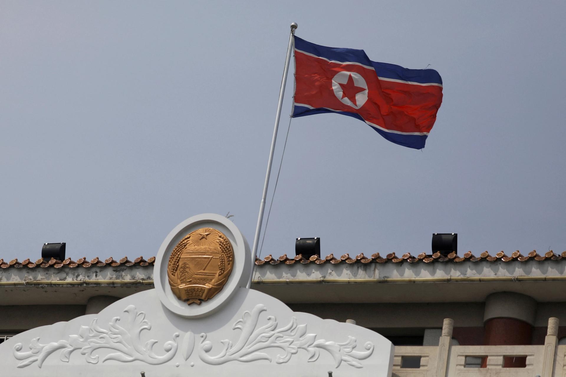 The North Korean flag flutters at the North Korea consular office in Dandong, Liaoning province, China, on April 20, 2021. 