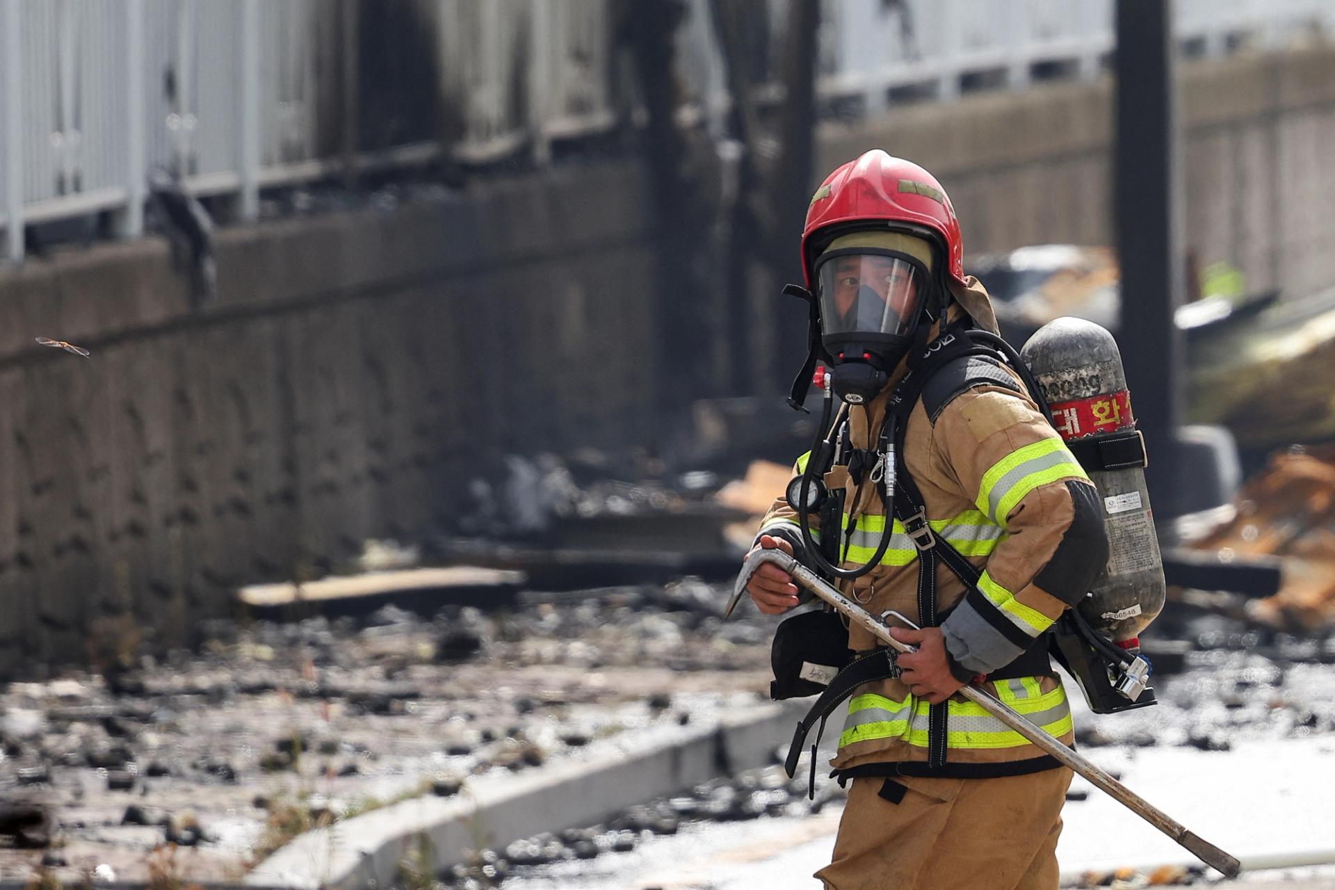 A firefighter on the site of the fire in Hwaseong, South Korea.