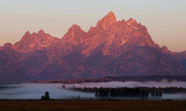 A picture of Grand Teton National Park near the site of the Federal Reserve Bank of Kansas City.