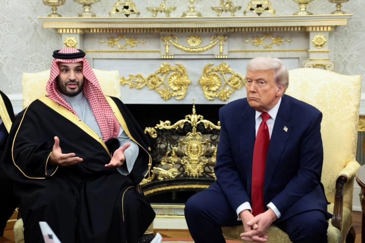 Saudi Crown Prince and Prime Minister Mohammed bin Salman speaks during a meeting with U.S. President Donald Trump in the Oval Office