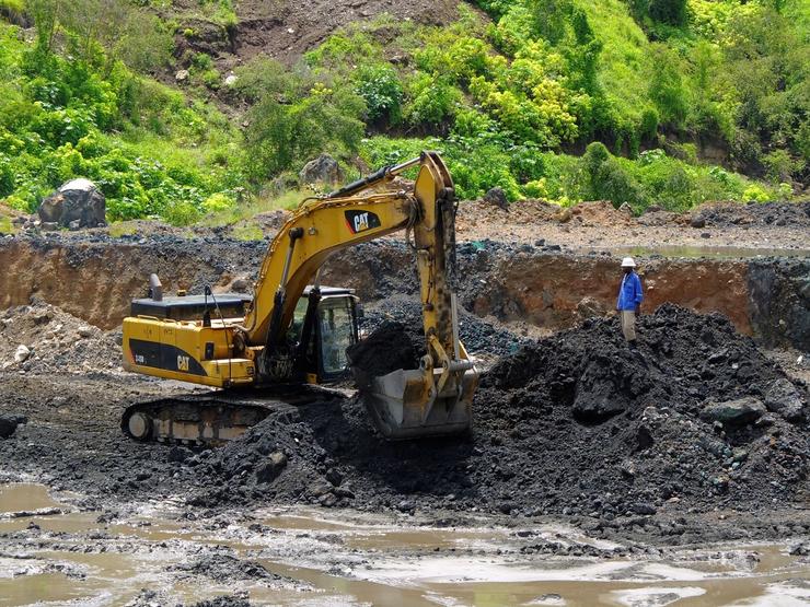 An excavator is used at the bottom of Congolese state mining company Gecamines’ Kamfundwa.