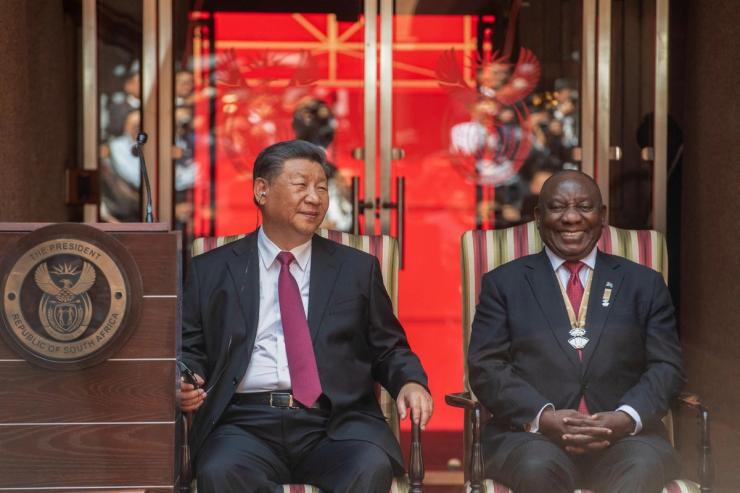 China’s leader Xi Jinping sits next to South Africa’s President Cyril Ramaphosa at a BRICS summit in 2023.