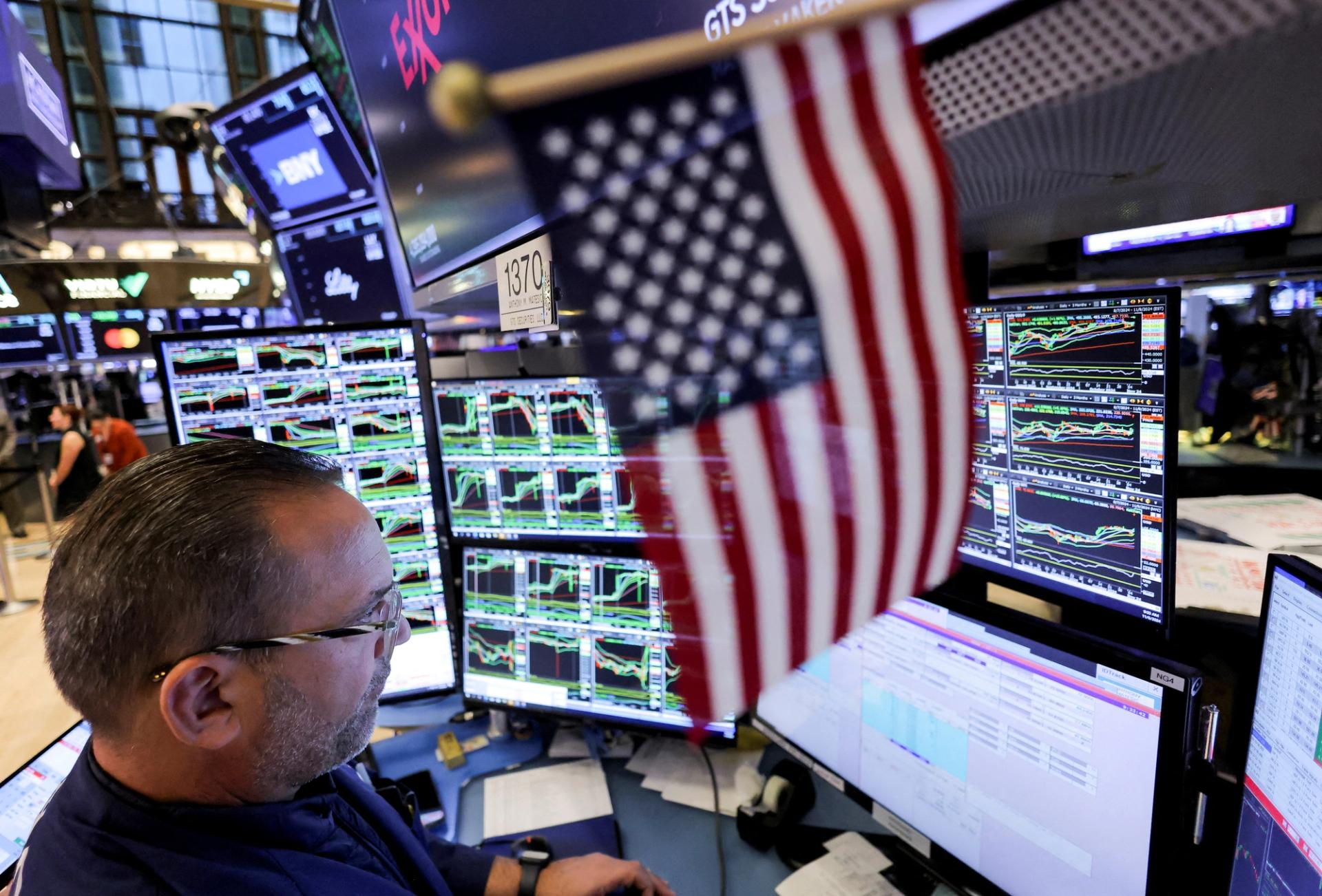 A trader works at the New York Stock Exchange.