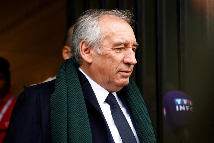 Prime Minister François Bayrou exits the offices of the high commissioner for planning in Paris, France