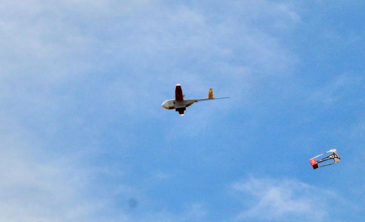 A drone drops its first blood delivery in the compound of Kabgayi hospital south of Kigali.