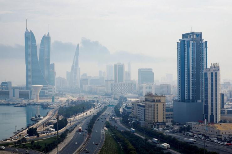 Smoke rises following a strike on Bahrain airport on Muharraq Island.