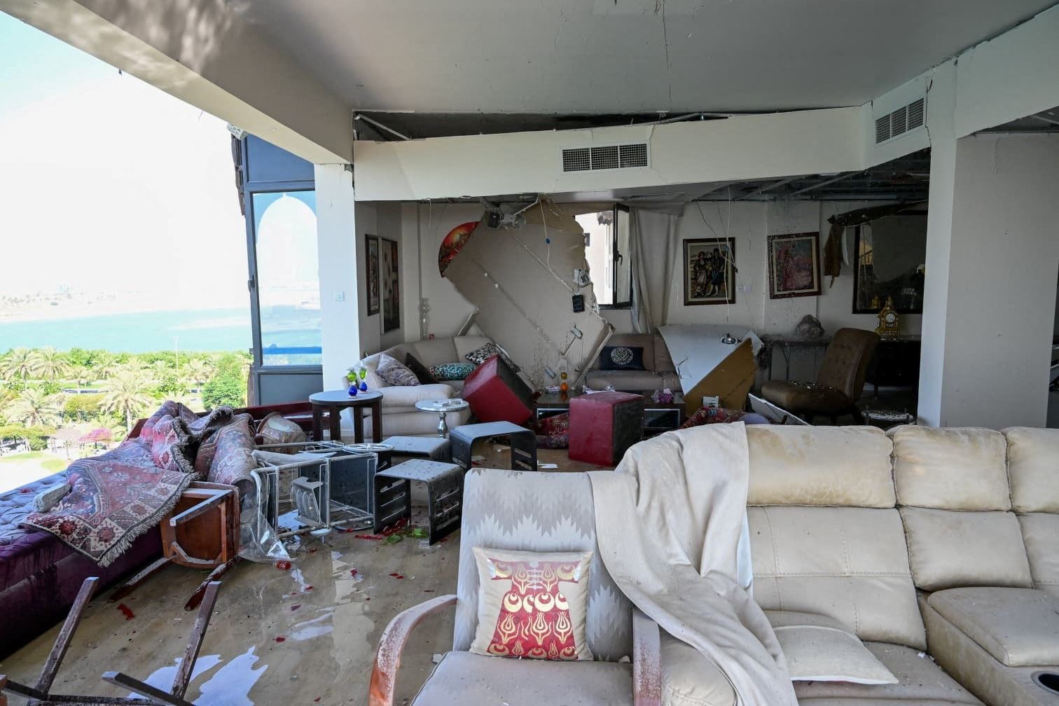 A damaged apartment in a residential building, which according to the Bahraini Interior Ministry, was hit by an Iranian drone, in Muharraq, Bahrain, June 28, 2026. 