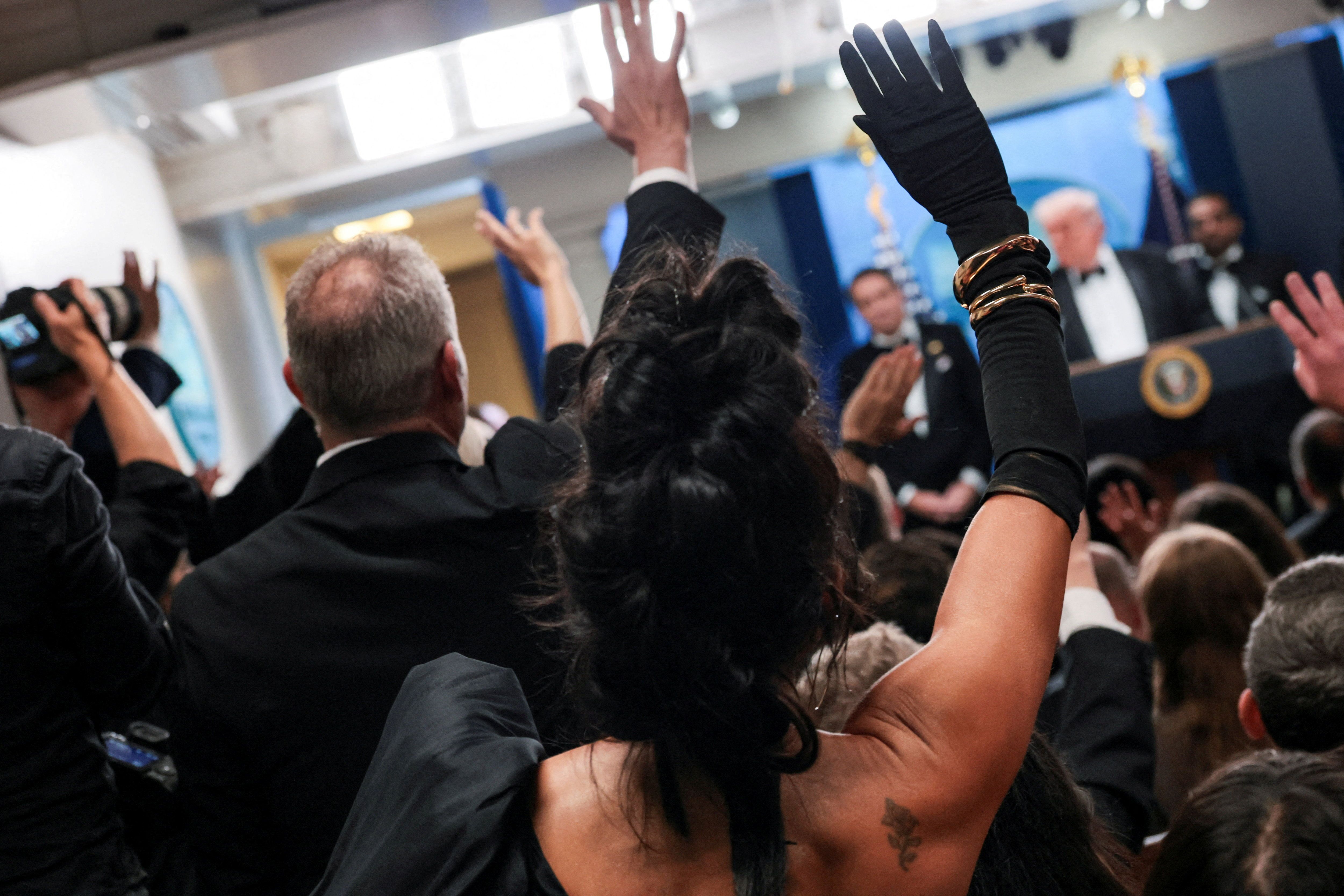 Journalists ask Trump questions after the shooting